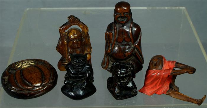 Appraisal: carved wood or resin netsuke or figurines to h Estimate