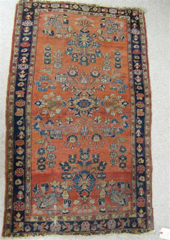 Appraisal: ANTIQUE PERSIAN SAROUK AREA RUG floral design on red ground