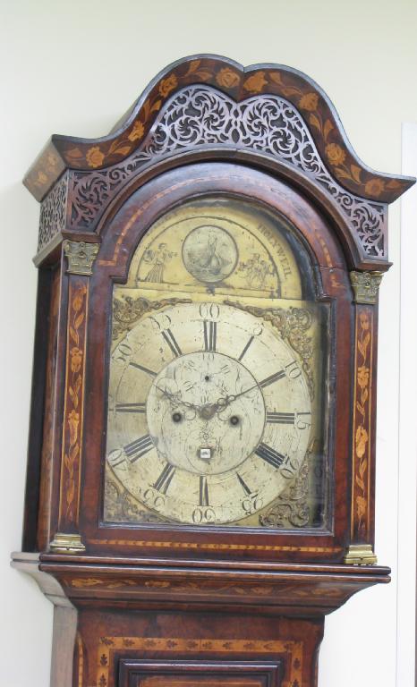 Appraisal: A Dutch style marquetry Longcase Clock having arched brass dial