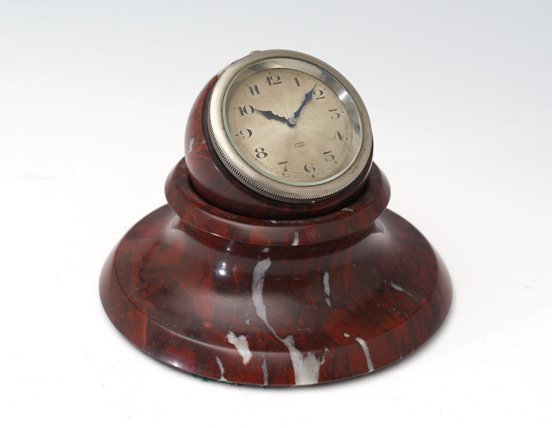 Appraisal: SWISS MARBLE BALL ON PEDESTAL DESK CLOCK Deep red variegated