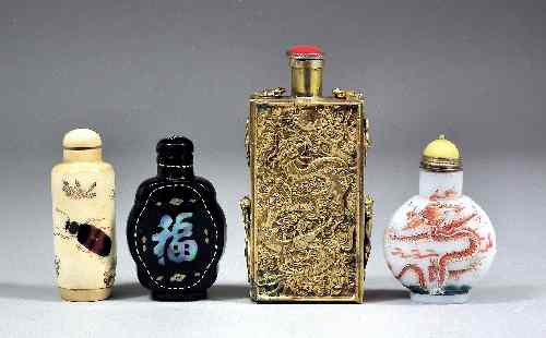 Appraisal: A Chinese bone snuff bottle and stopper carved with insects