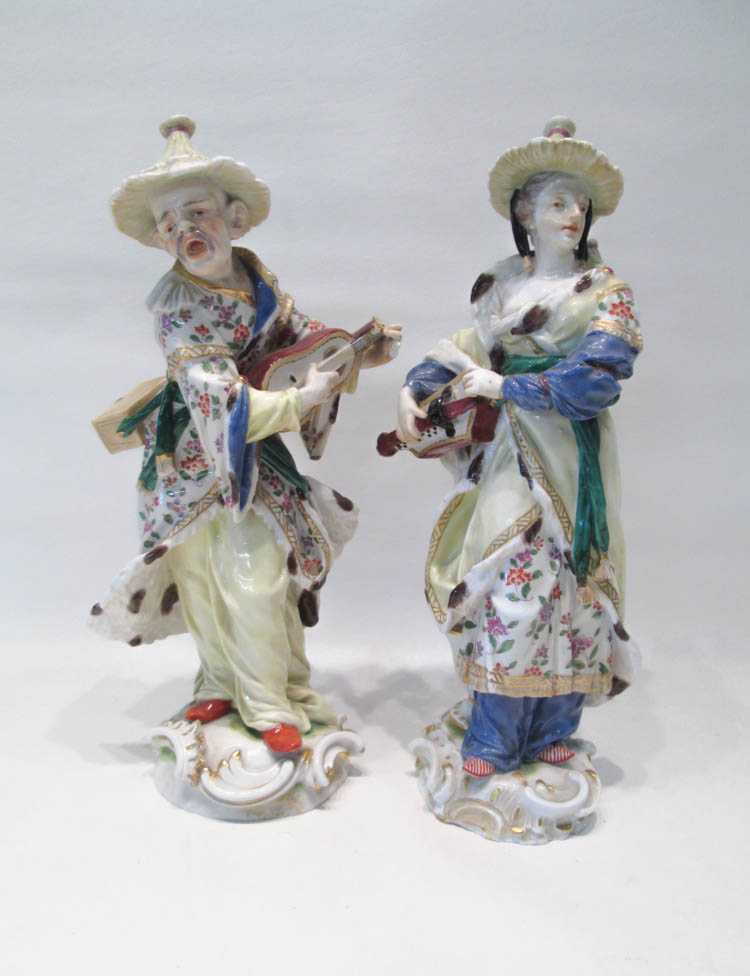 Appraisal: PAIR OF MEISSEN PORCELAIN MALABAR FIGURES th century depicting a