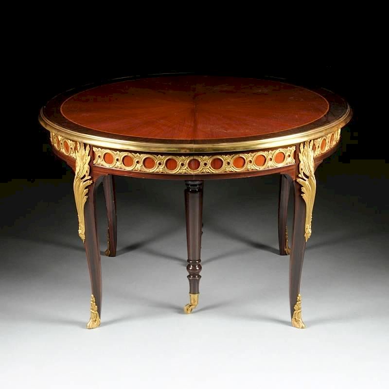 Appraisal: A LOUIS XV XVI TRANSITIONAL STYLE GILT BRONZE MOUNTED KINGWOOD