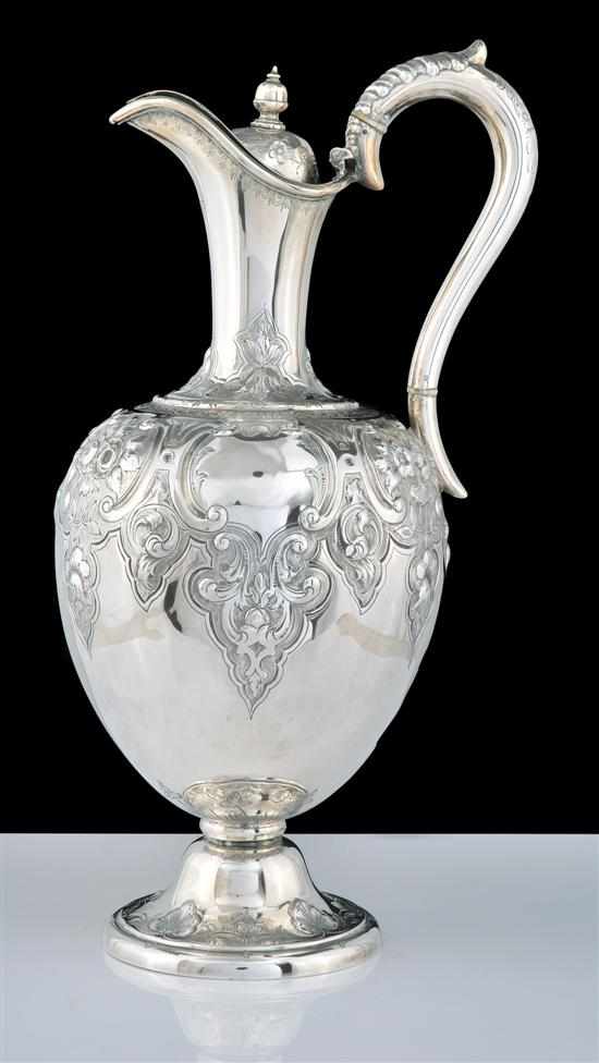 Appraisal: A Victorian sterling silver wine ewer Makers mark Martin Hall