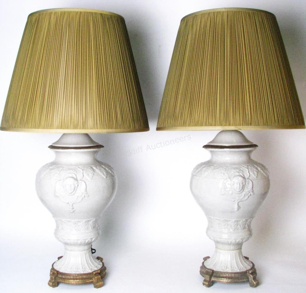 Appraisal: A pair of porcelain table lamps by Castilian with embossed