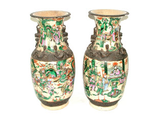 Appraisal: Pair of Chinese crackle glazed vases painted with scenes fighting