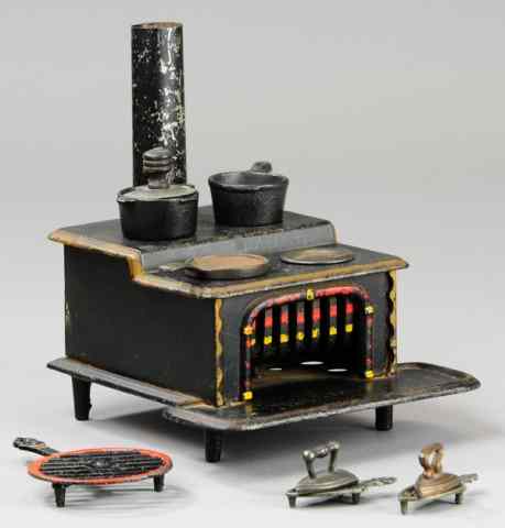 Appraisal: J E STEVENS STOVE AND ACCESSORIES Cast iron ''Bay State''