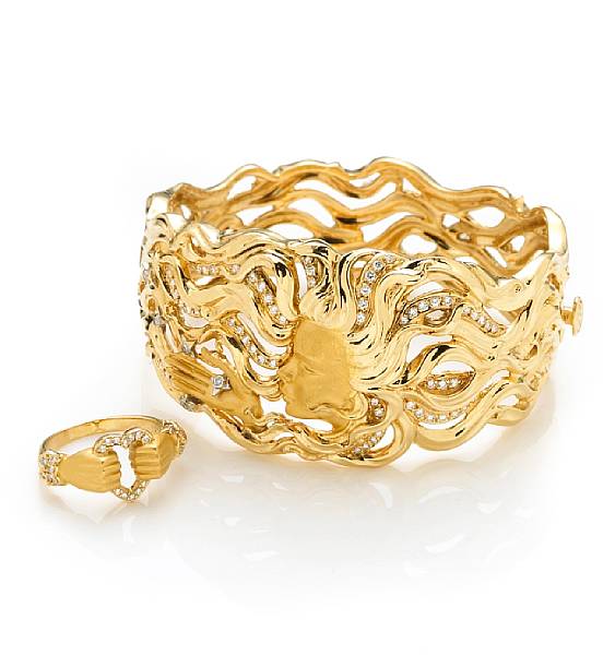 Appraisal: A diamond and eighteen karat gold cuff bracelet and ring