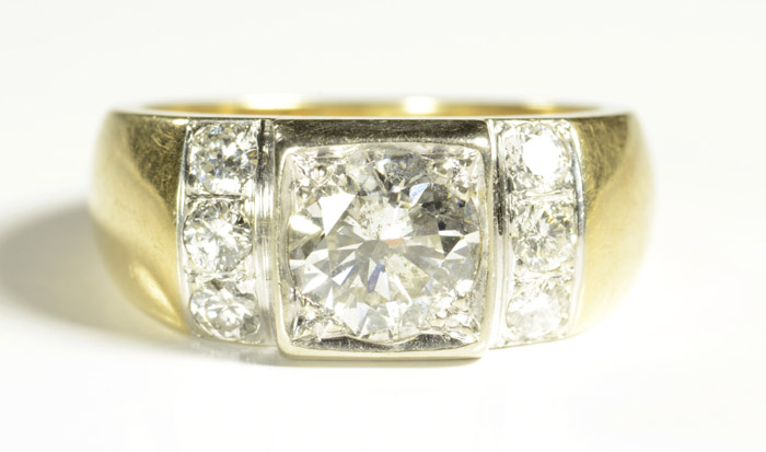 Appraisal: MAN'S DIAMOND AND FOURTEEN KARAT GOLD RING featuring a large