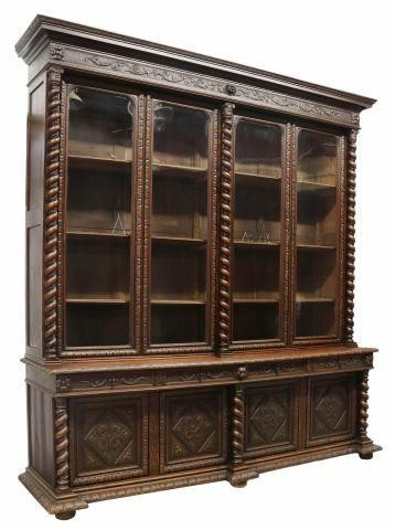 Appraisal: Monumental French Henri II style oak stepback bookcase late th