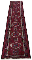 Appraisal: A Karajeh Runner Seven bold geometric medallions with ivory geometric