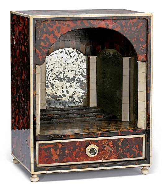 Appraisal: A Continental tortoiseshell and ivory mirrored display stand composed of