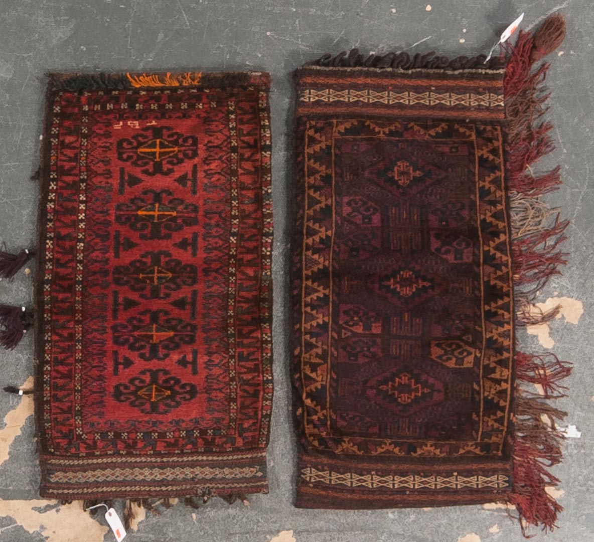 Appraisal: Two Afghan saddle bag rugs x and x Afghanistan modern