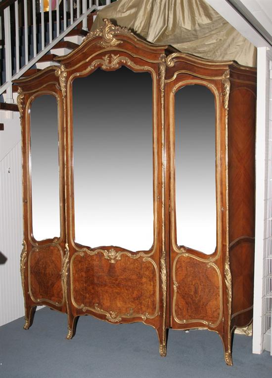 Appraisal: LOUIS XV-STYLE CARVED MAHOGANY THREE-SECTION ARMOIRE late th-early th century