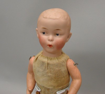 Appraisal: Germany Heubach Whistler Marked with Heubach Square this doll has