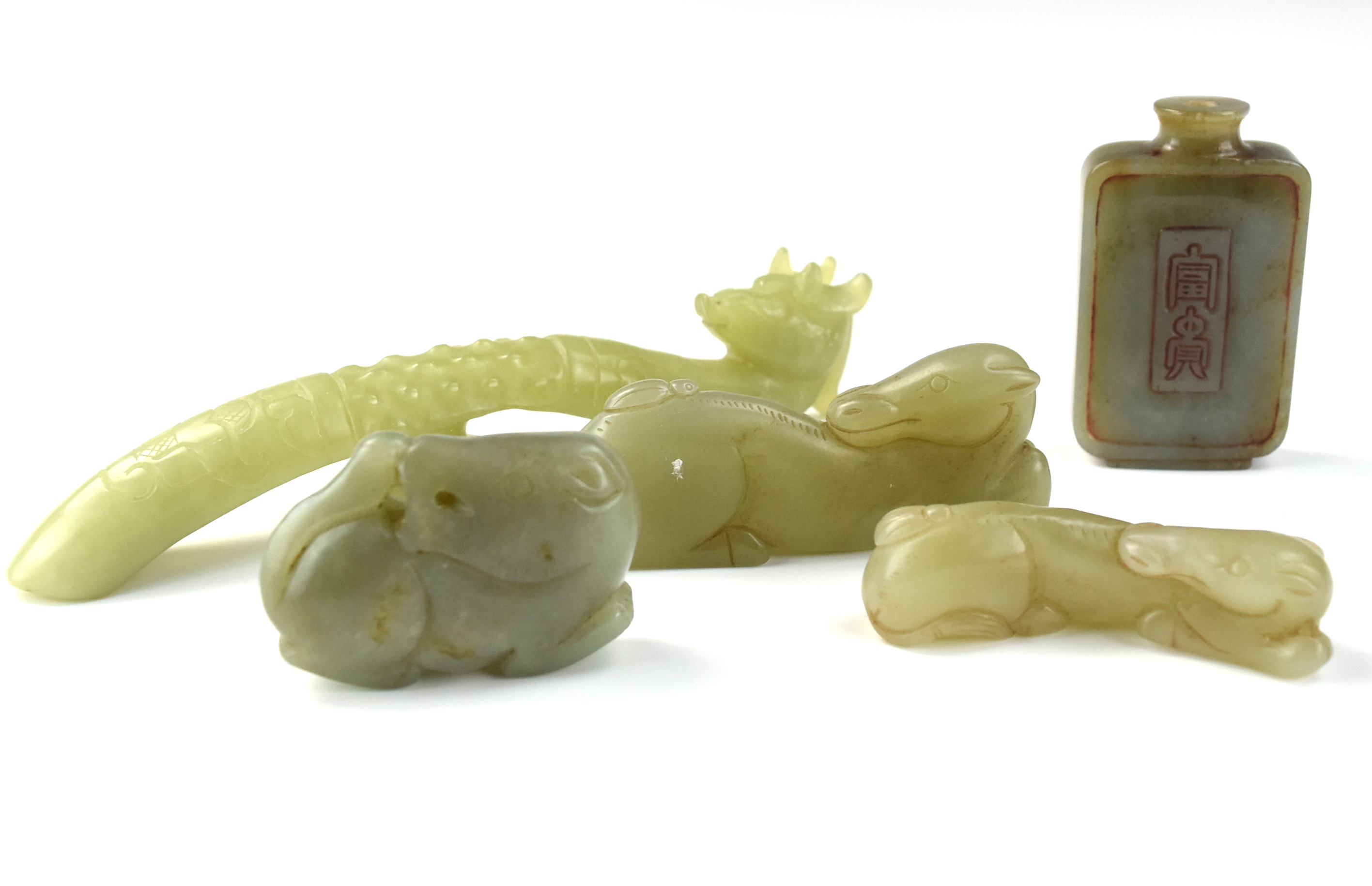 Appraisal: GROUP OF FIVE CHINESE GREEN JADE ORNAMENTS comprised of a