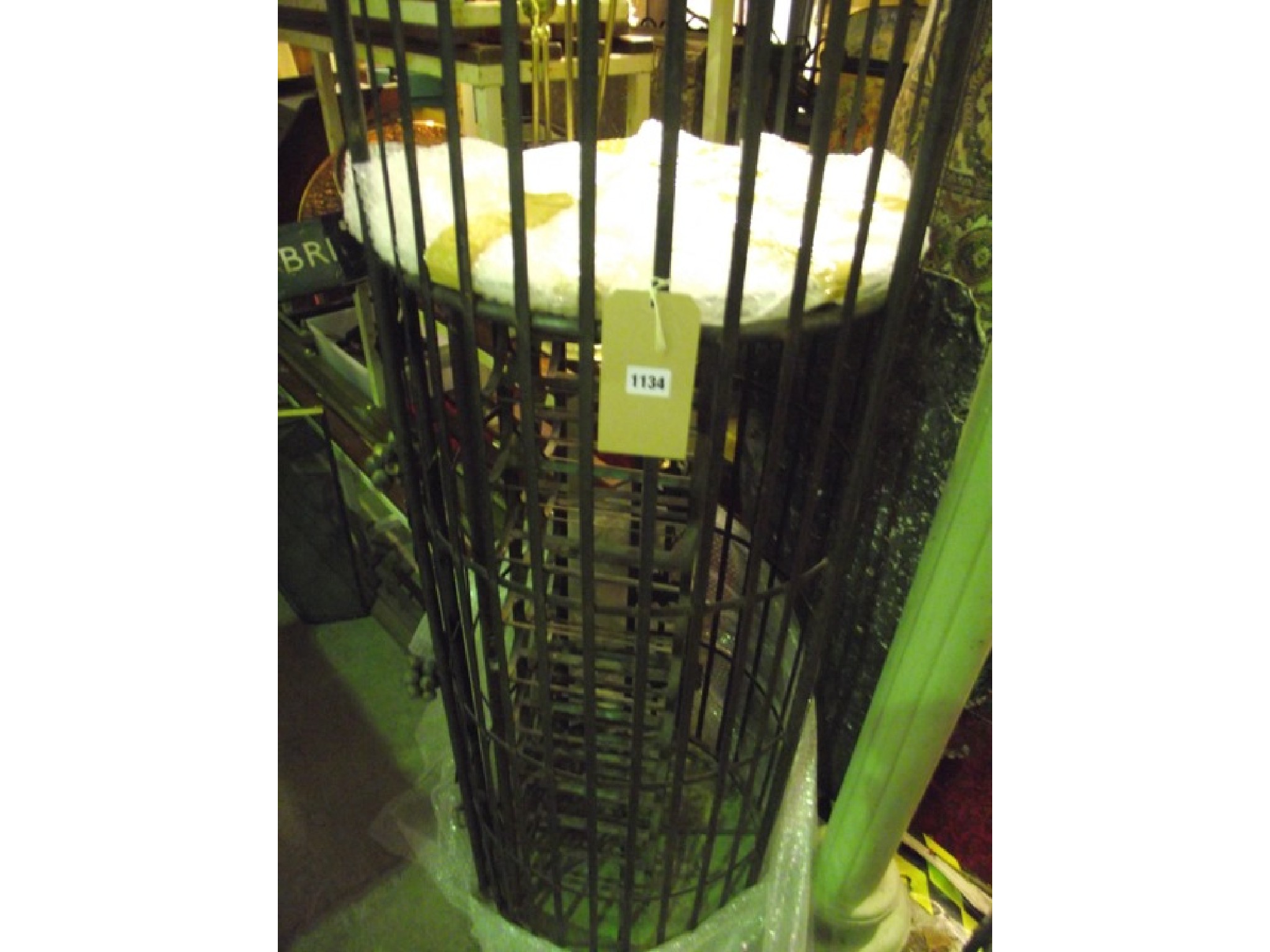 Appraisal: A large contemporary steel floorstanding hanging cage of cylindrical form