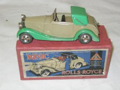 Appraisal: A Minic Rolls Royce open tourer clockwork powered battery operated