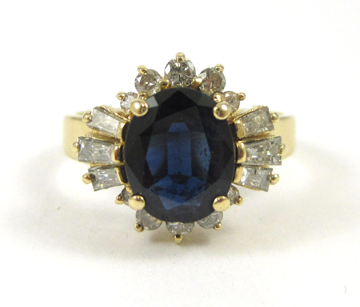 Appraisal: SAPPHIRE DIAMOND AND FOURTEEN KARAT GOLD RING with ten round-cut