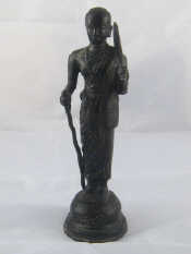 Appraisal: A Tibetan bronze figure of a monk ht cm