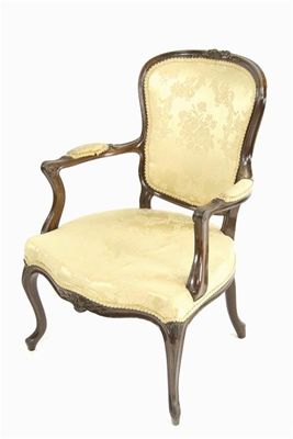 Appraisal: A mahogany Hepplewhite open armchair with carved foliage decoration to