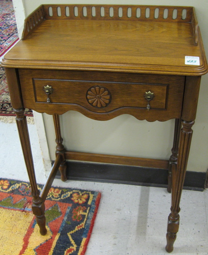 Appraisal: WALNUT TELEPHONE STAND American c 's having a rectangular top