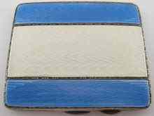 Appraisal: A silver cigarette case decorated with blue and white enamel