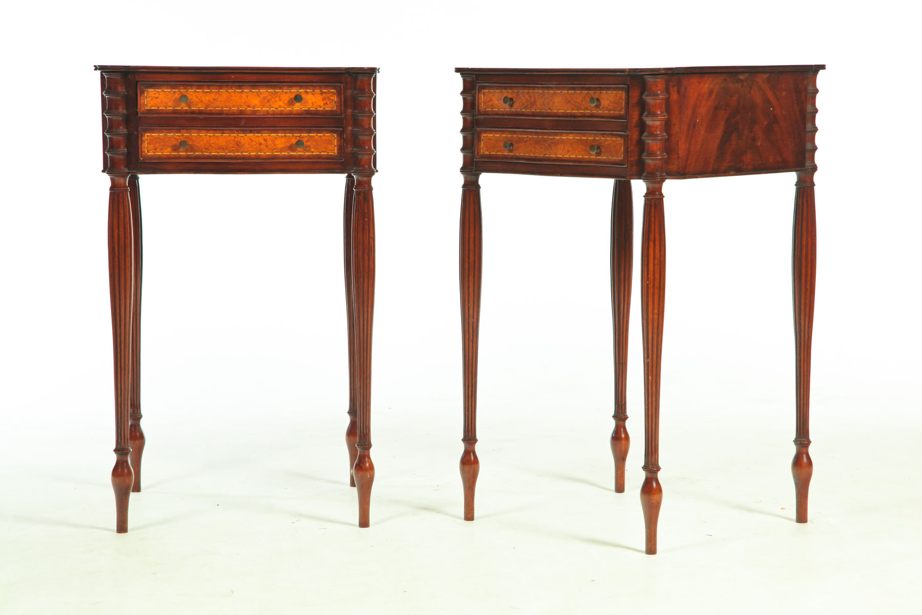 Appraisal: PAIR OF SHERATON-STYLE WORK TABLES American th century mahogany with