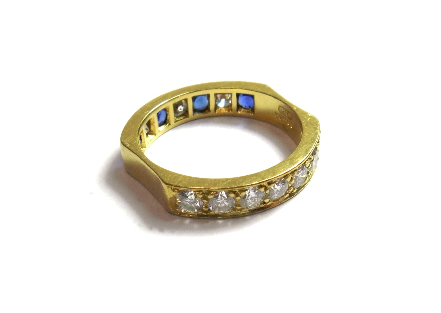 Appraisal: An ct gold diamond and sapphire set twin sided eternity