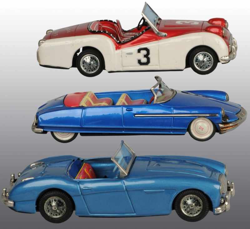 Appraisal: Lot of Tin European Model Auto Friction Toys Description Japanese