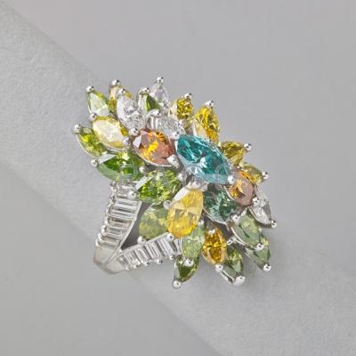 Appraisal: FANCY COLOR DIAMOND PLATINUM COCKTAIL RING Irradiated blue green and