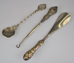 Appraisal: A silver-handled button hook and shoe-horn to w a Maltese