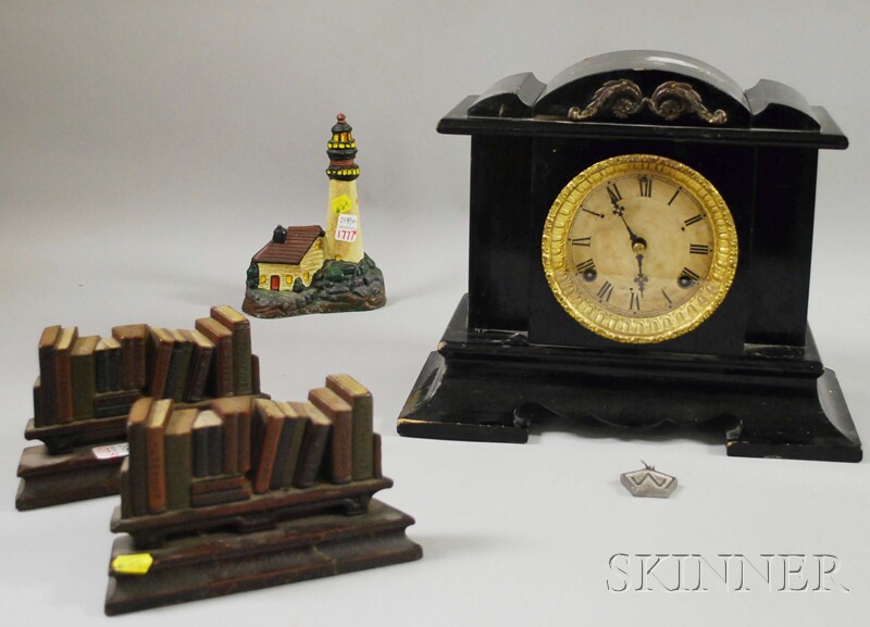 Appraisal: Mantel Clock Painted Cast Iron Bookshelf-form Bookends and a Lighthouse