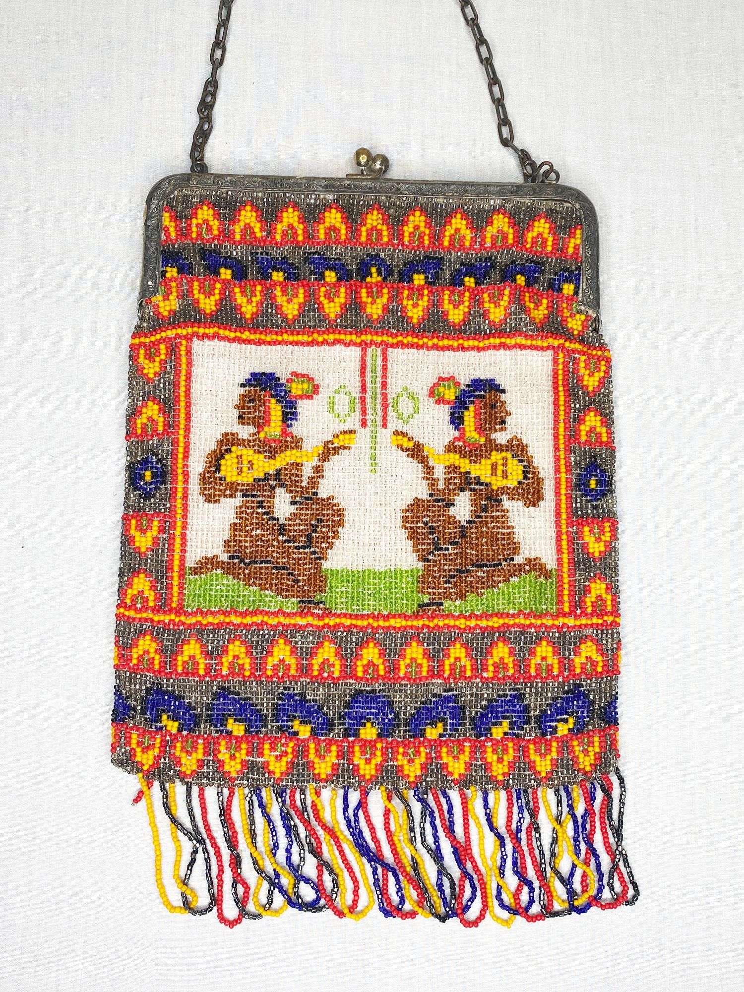 Appraisal: Art Deco Micro Beaded Native Musicians Purse long fringe included