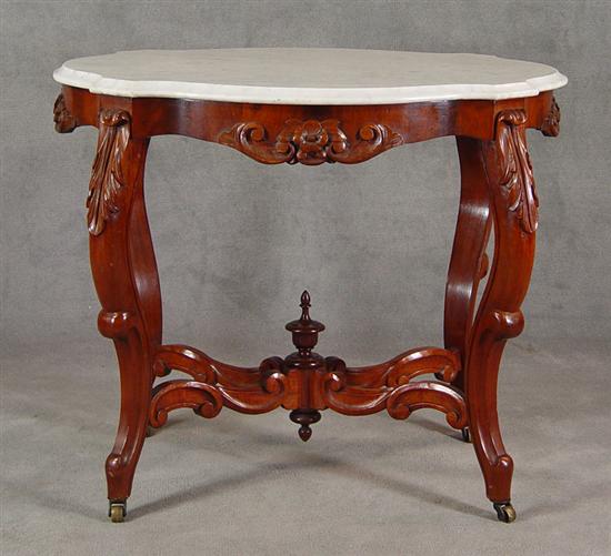 Appraisal: Victorian Parlor Table Circa Walnut and veneers Turtle shaped white