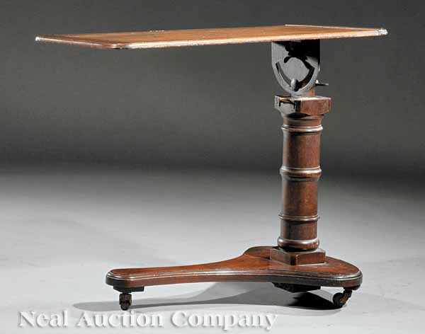 Appraisal: An American Walnut Invalid's Table th c adjustable plank top