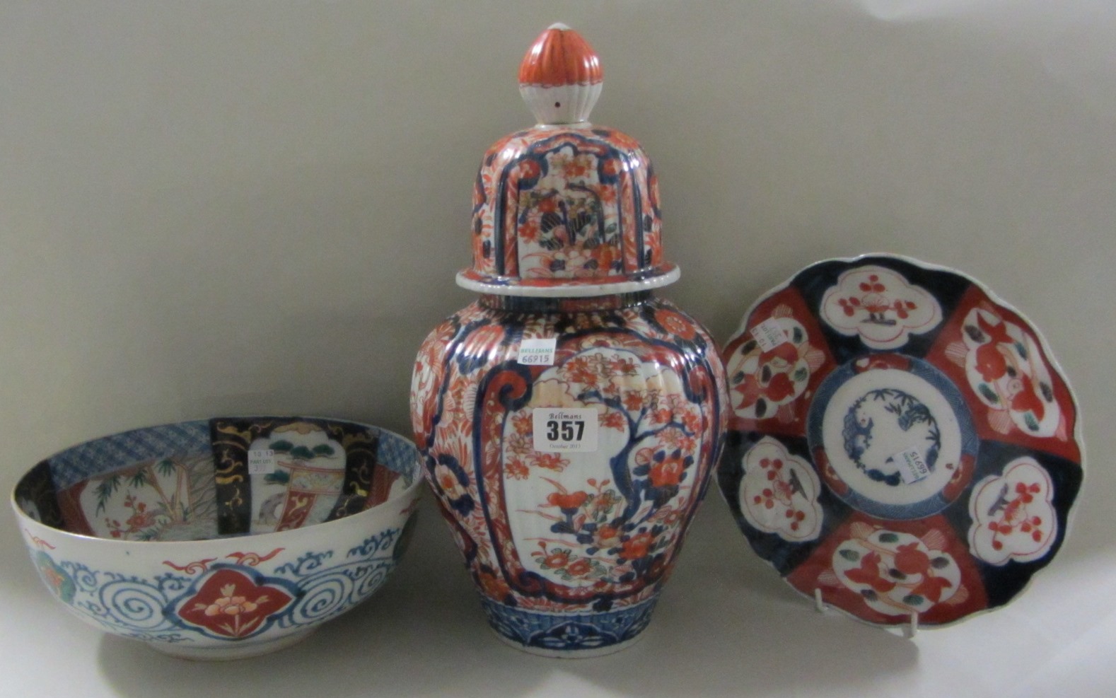 Appraisal: A Japanese Imari fluted ovoid vase and cover Meiji period