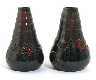 Appraisal: A pair of Sunflower Pottery vases by Sir Edmund Elton