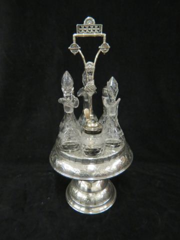 Appraisal: Victorian Silverplate Etched Glass Castor Set rotating center handle complete