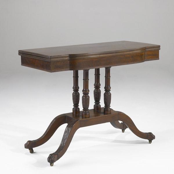 Appraisal: ENGLISH REGENCY GAMES TABLE In mahogany with serpentine front and