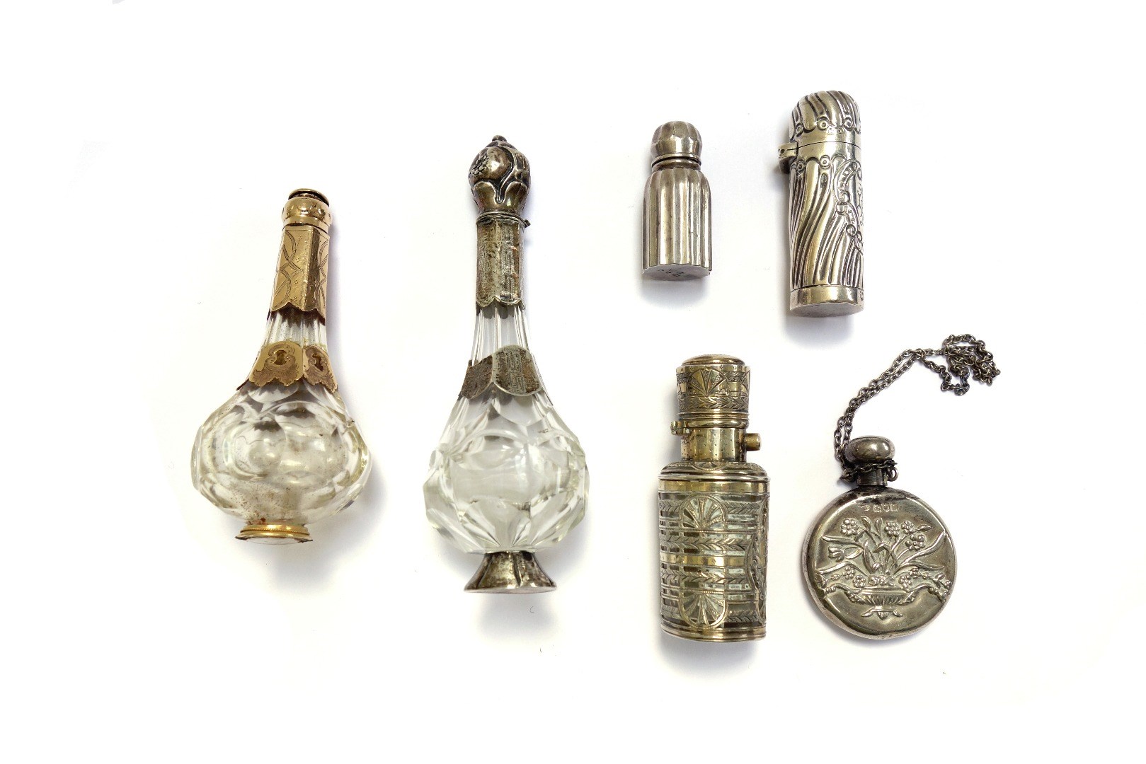 Appraisal: An embossed silver scent bottle hallmarked Birmingham cm together with