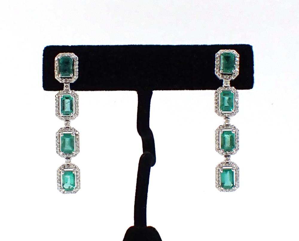 Appraisal: PAIR OF EMERALD AND DIAMOND DROP EARRINGS each k white