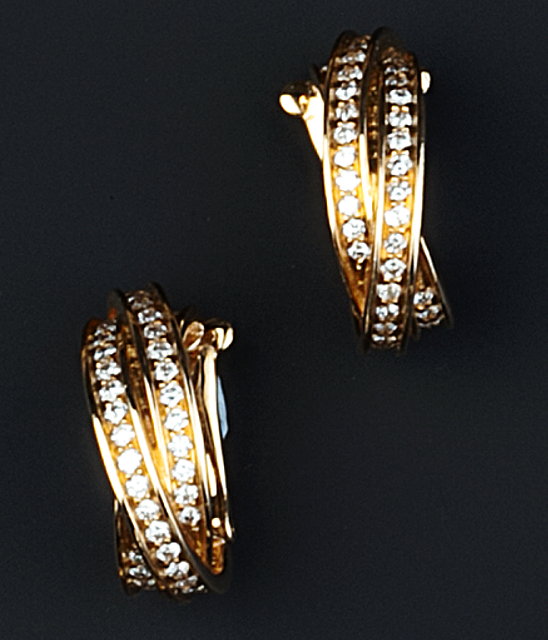 Appraisal: A PAIR OF DIAMOND SET EARHOOPS BY CARTIER each designed