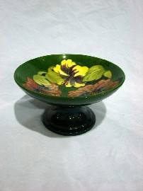 Appraisal: A Moorcroft green ground Hibiscus comport pre paper label and