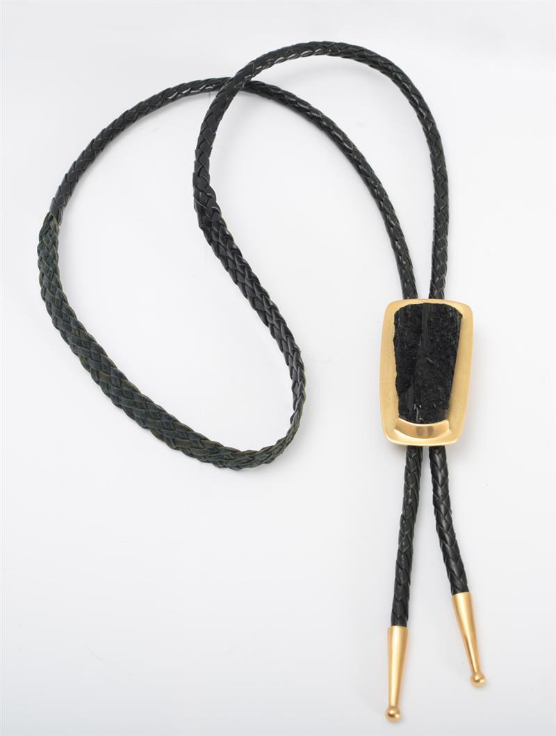 Appraisal: K GOLD AND COAL BOLO TIE Signed 'Andrew' and stamped