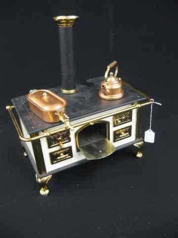 Appraisal: Toy Coal Stove deluxe model brass trim with pots ''