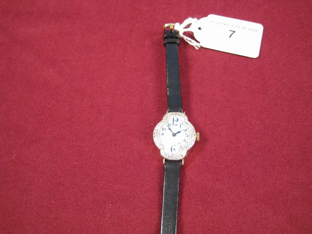 Appraisal: A Lady's Cocktail Watch with quatrefoil shape dial having purple