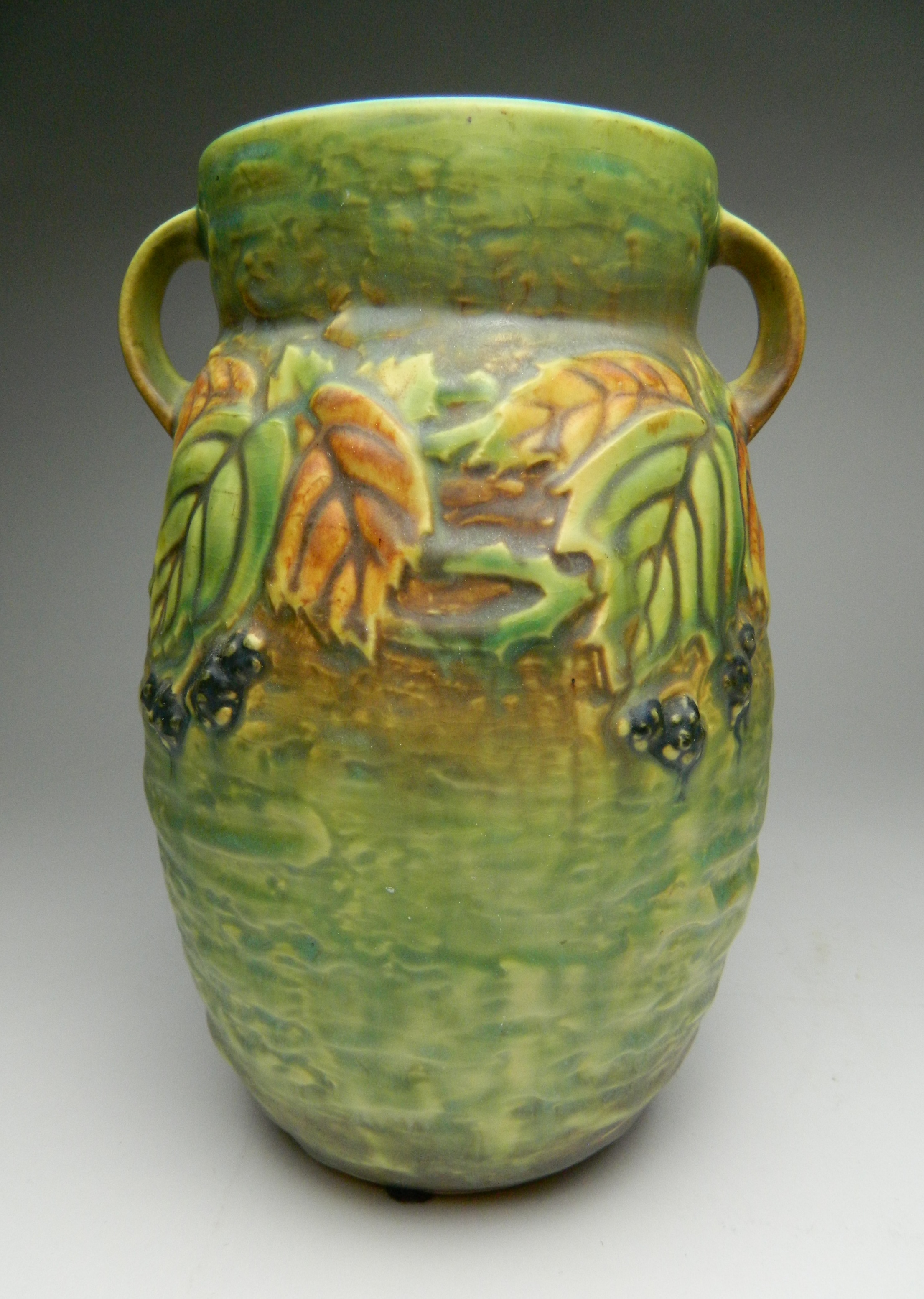 Appraisal: Roseville pottery Blackberry vase ca 's pattern design by Frank