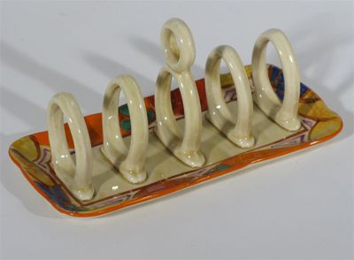 Appraisal: Melon' a Clarice Cliff Fantasque Bizarre toast rack painted in