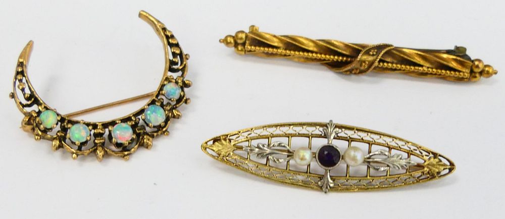 Appraisal: LOT OF ANTIQUE LADIES GOLD PINS One kt semi circle